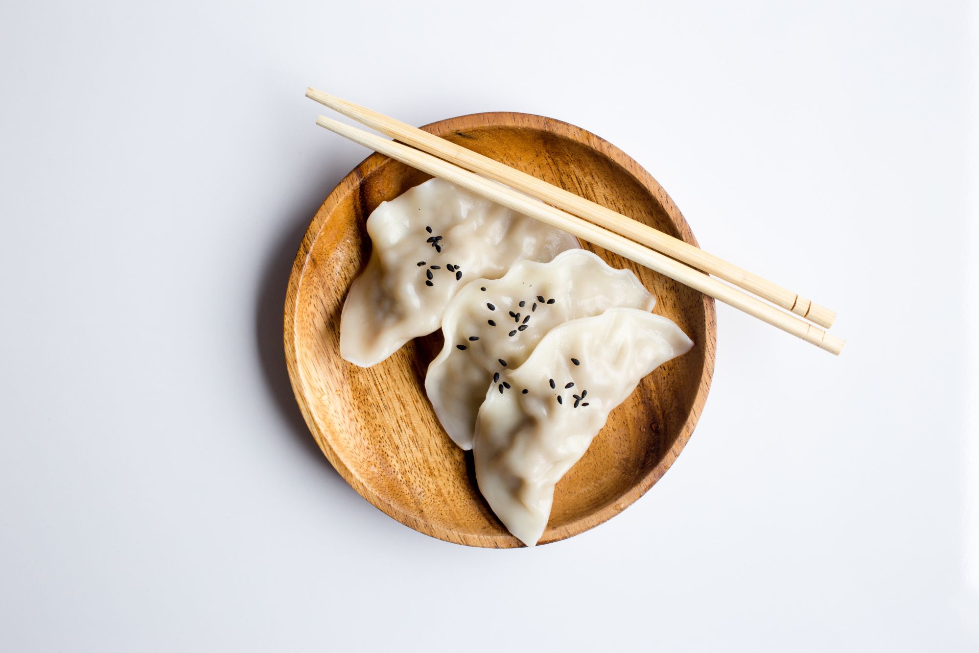 Bamboo chopsticks and dumplings