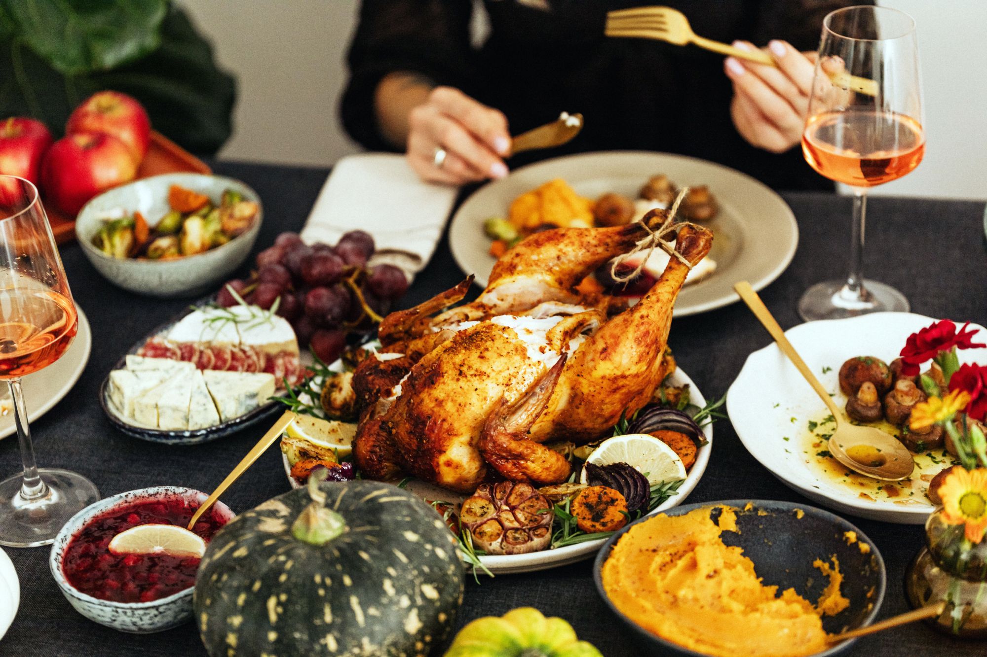 Family enjoying a sustainable Thanksgiving meal with bamboo
