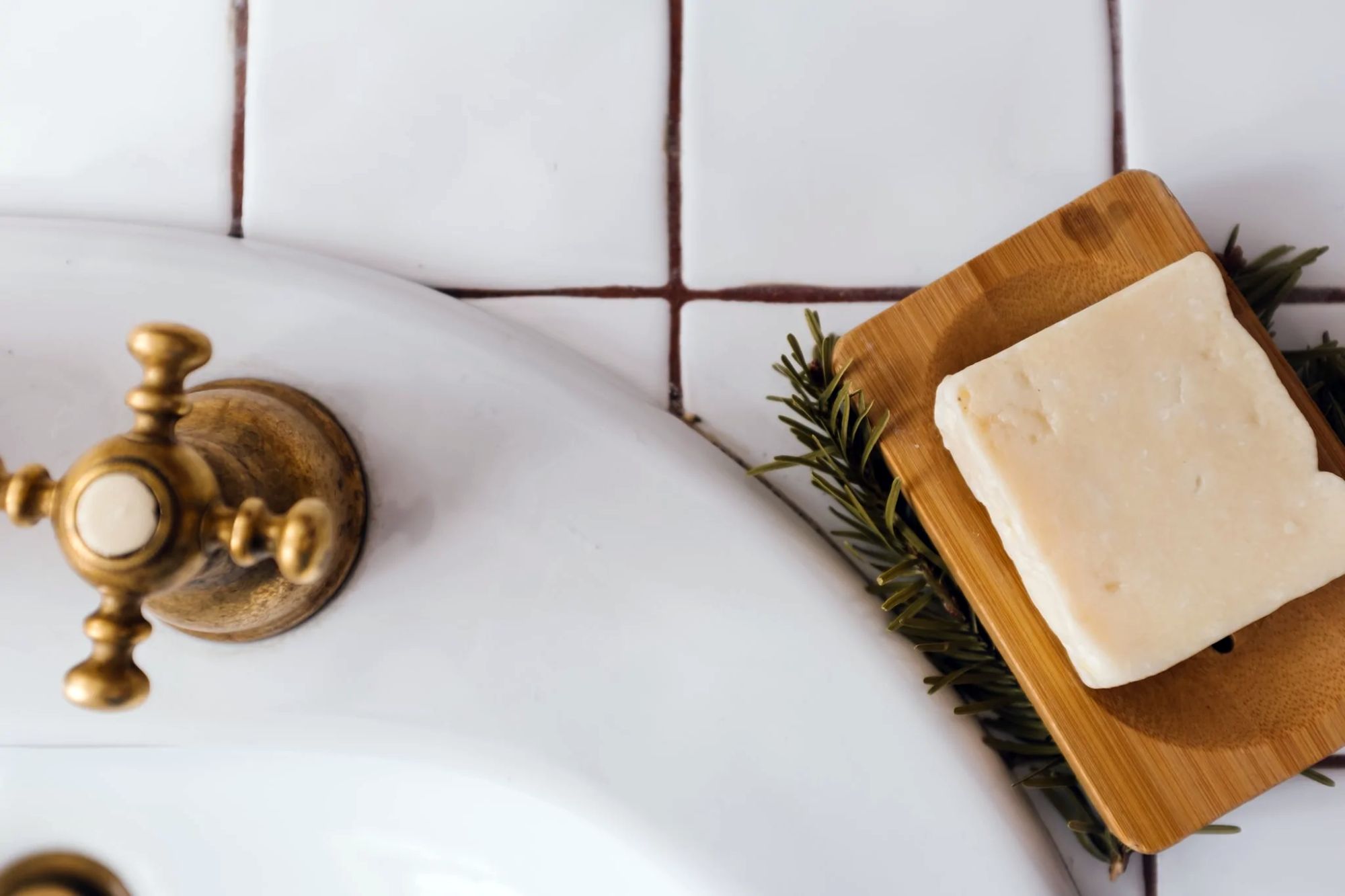Bamboo soap dish at sink; bamboo bathroom accessories